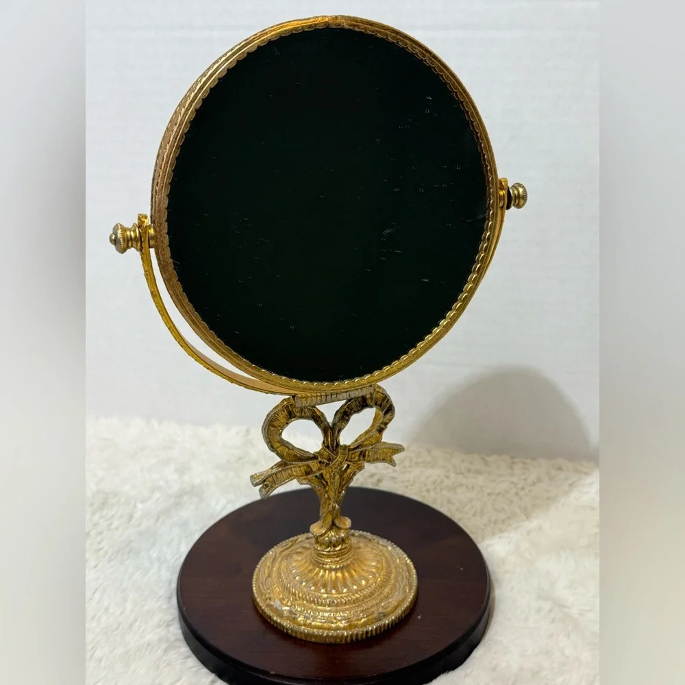 VTG Stylebuilt double sided gold-tone tilting vanity mirror with a ornate stand